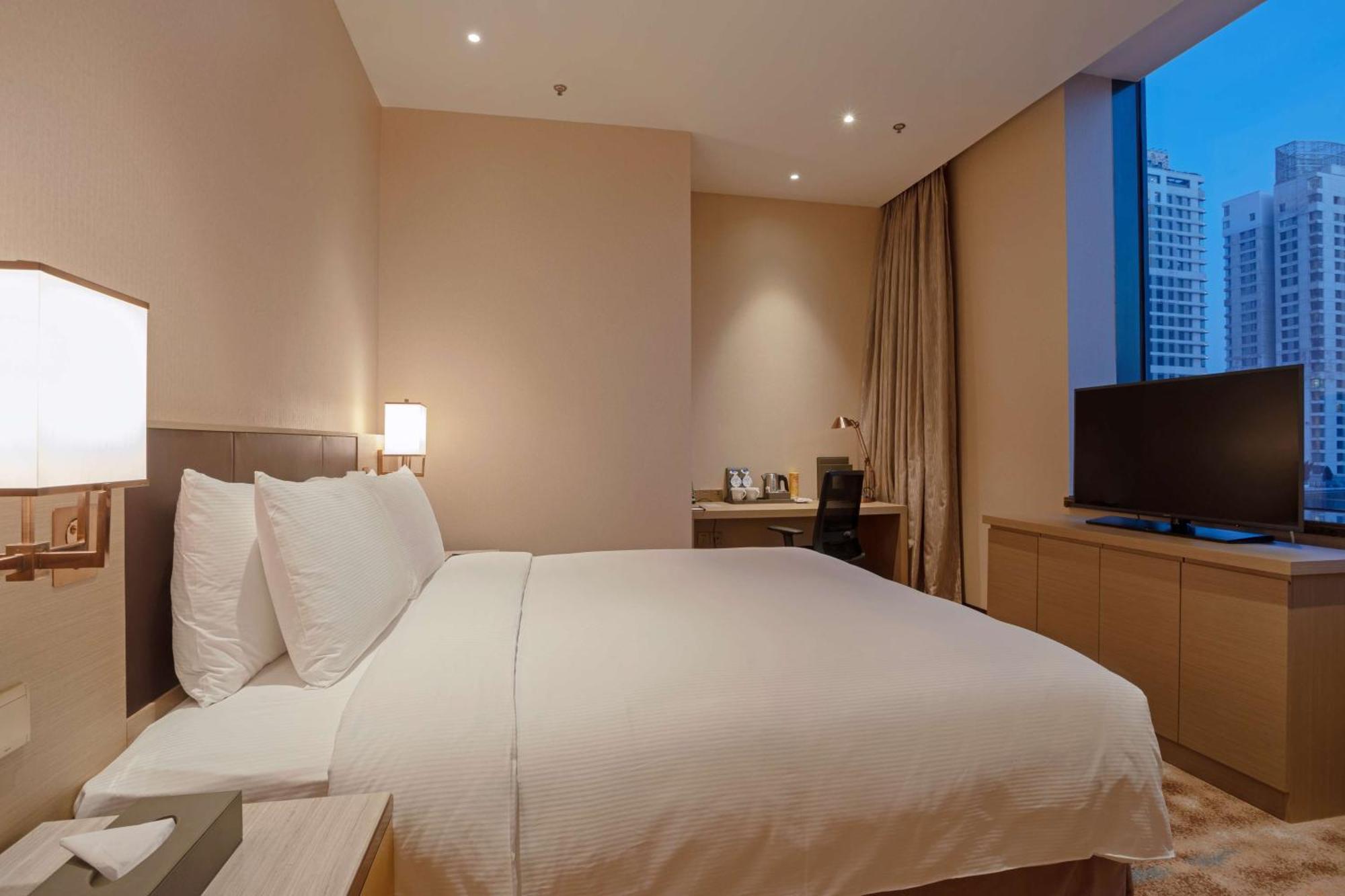 Hilton Shenyang Hotell Exteriör bild